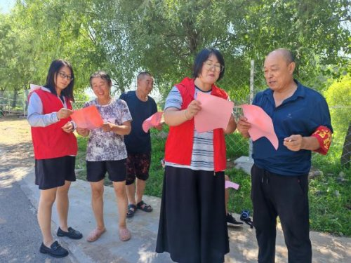 “伊心向阳”志愿红 防汛护河暖民心